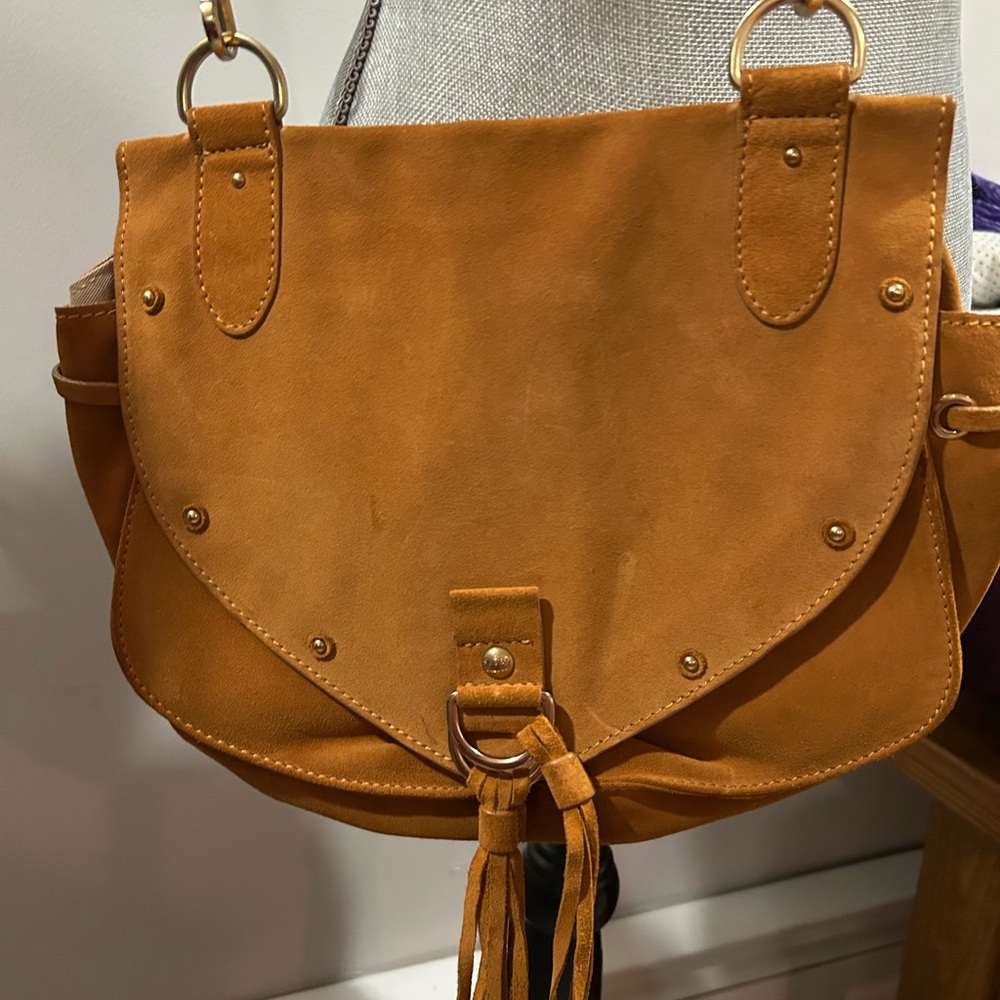 Chloe CollinsEUC COA Tan Crossbody Saddle Bag with Decorative Closure and Tassel